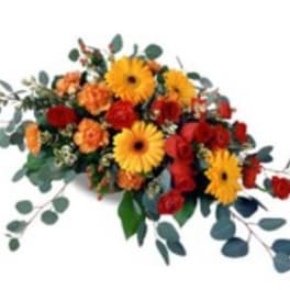 Mixed bouquet of yellow gerbera daisies and red-orange flowers