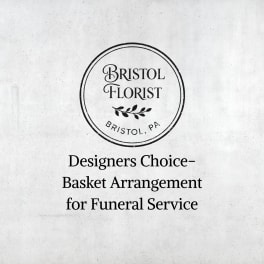 Text reading Designers Choice Basket Arrangement for Funeral Service