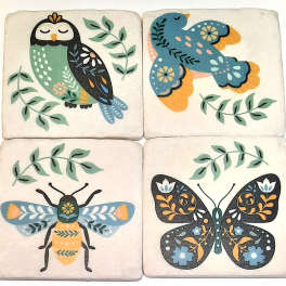 Four decorative tiles with stylized owl, bird, bee, and butterfly designs