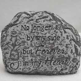 Decorative stone with the words "No longer by my side but forever in my heart"