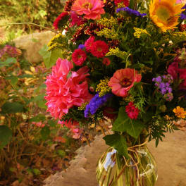 Colorful mixed bouquet in a clear glass vase