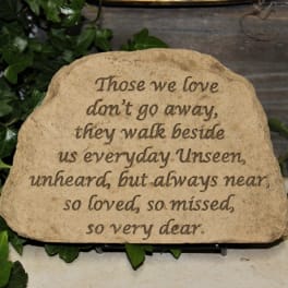 Engraved memorial stone with a sympathy quote