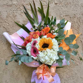 Bouquet with sunflowers, gerbera daisies, roses, and white hydrangeas