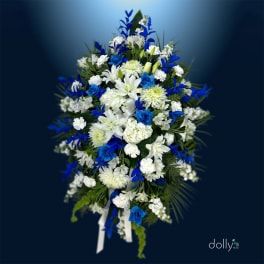Blue and white floral standing spray with ribbon tails