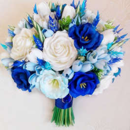 Blue and white bouquet with roses and tulip-like blooms