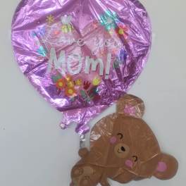 Pink heart balloon with "Love you Mom!" and a teddy bear balloon
