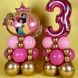Princess-themed balloon arrangement with a pink number 3 balloon