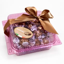 Pink gift box of assorted chocolates tied with a brown satin bow