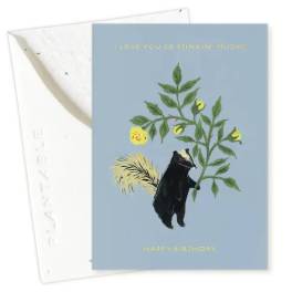 Birthday card with a bear holding yellow flowers