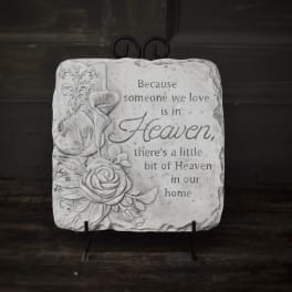 Decorative memorial plaque with roses and a sympathy quote