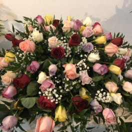 Large bouquet of multicolored roses with baby's breath