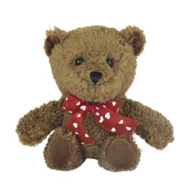 Brown teddy bear with a red heart-pattern ribbon