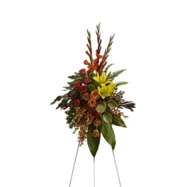 Tall floral standing spray with yellow lilies and red roses