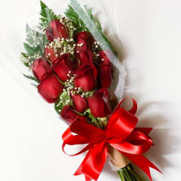 Bouquet of red roses with baby's breath and a red ribbon