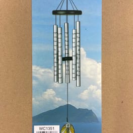 Packaged silver wind chime with a church pendant