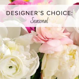 Designer’s choice seasonal bouquet with pink and white flowers