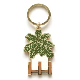 Keychain with a green leaf-shaped charm and metal ring