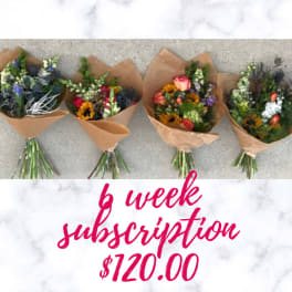 Four mixed flower bouquets wrapped in brown paper with a subscription price graphic