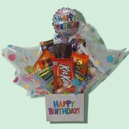 Birthday candy gift box with a foil balloon and assorted chocolates