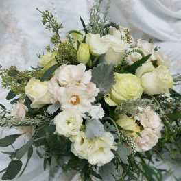White and pale green bridal bouquet with roses and lisianthus