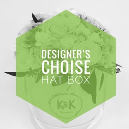 White hat box arrangement with mixed roses and foliage