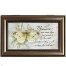 Framed butterfly wall art with a quote and pale floral illustration
