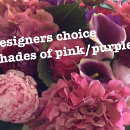 Close-up of a designer's choice pink and purple bouquet with hydrangeas, dahlias, peonies, and calla lilies