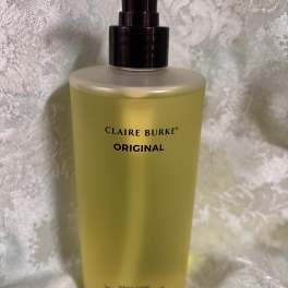 Yellow hand soap bottle with a black pump dispenser