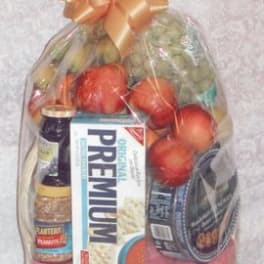 Gift basket with snacks and a large orange bow