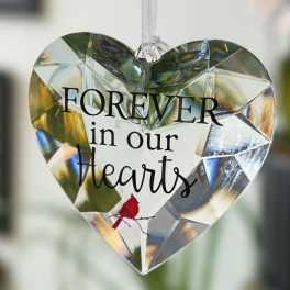 Heart-shaped hanging ornament with the words "FOREVER in our Hearts"