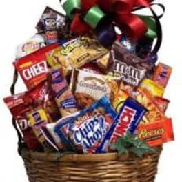 Basket of assorted snack bags topped with a large ribbon bow