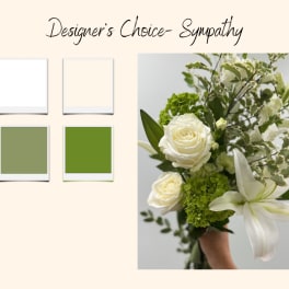 White roses and a white lily in a green-and-white bouquet
