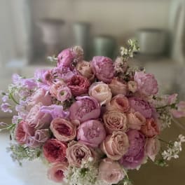 Pink and blush rose bouquet in a low vase