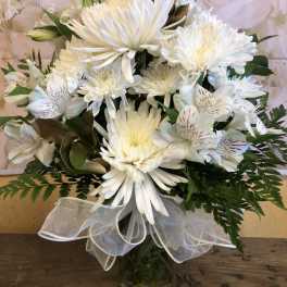 White chrysanthemum bouquet with alstroemeria in a glass vase