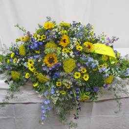 Large mixed bouquet with yellow sunflowers and blue flowers