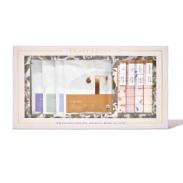 Tea gift set in a white box with assorted tea sachets and cubes