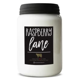 White jar candle with black lid and Raspberry Lane label on the front