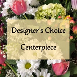 Designer's choice centerpiece with pink tulips and white daisies