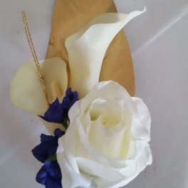White rose with purple accents and gold decorative leaves