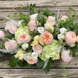 Blush and peach rose bouquet with pale green hydrangeas