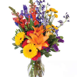 Colorful mixed bouquet in a clear glass vase