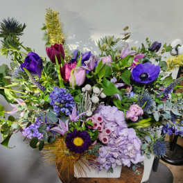 Large mixed bouquet with purple, pink, and yellow flowers