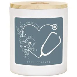 White candle jar with gold lid and nurse-themed label