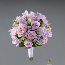 Lavender and pink rose bouquet with small purple flowers