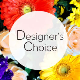 Colorful mixed flowers with a "Designer’s Choice" label