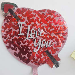 Heart-shaped foil balloon with "I Love You" text and red hearts