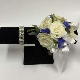 White Spray Rose and Blue Delphinium Corsage with Silver Rhinestone Wristlet