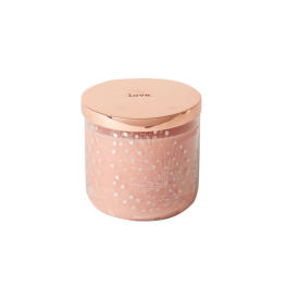 Pink candle in a glass jar with a rose-gold lid