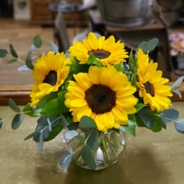 Sunflower bouquet in a clear glass vase