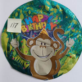 Round birthday balloon with a smiling monkey graphic